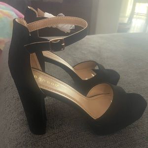 Black high heels (never worn)